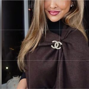 Elegant Gold and Crystal GG Brooch.